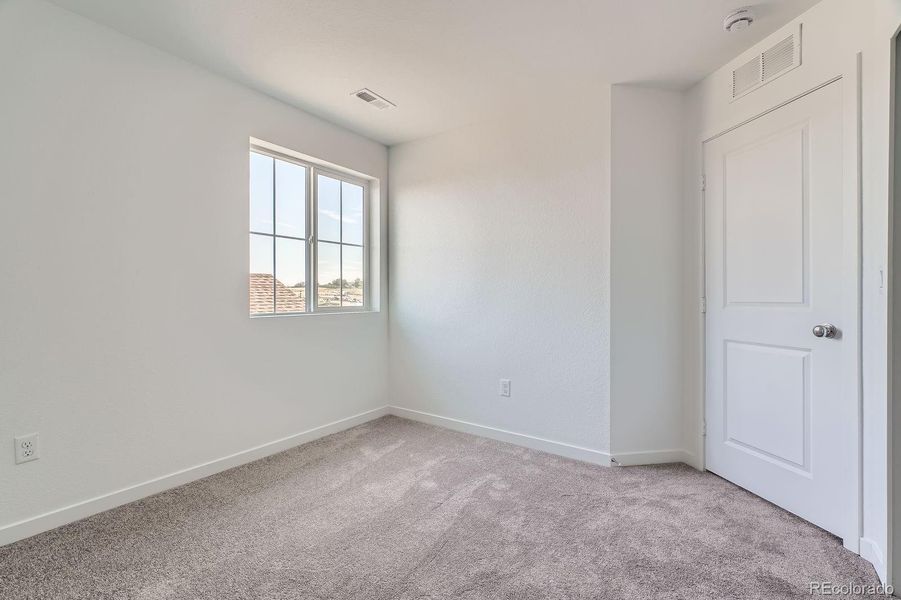 Spacious, unfurnished interior of a new home in Eastcreek Farm: Paired Homes, Thornton (Image 8).