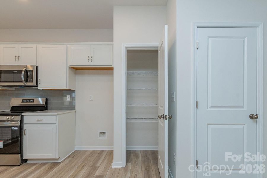 Furnished interior view inside a new home in Country Club Village, Salisbury (Image 6).