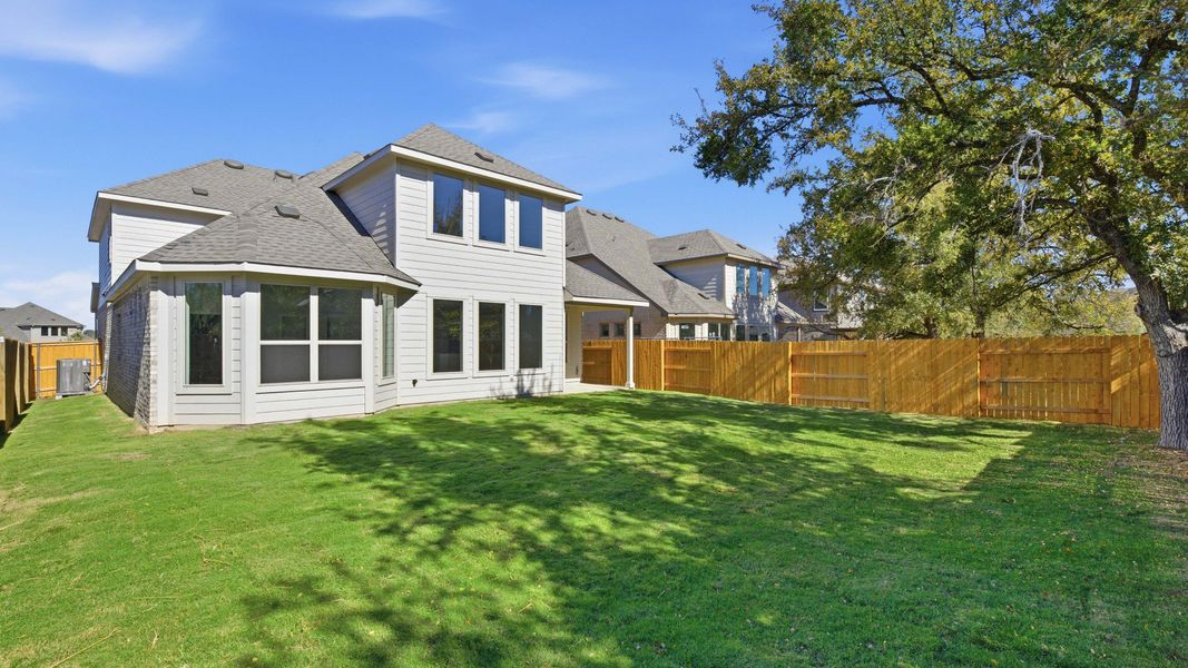 Exterior details and patio area of a home in Oaks at San Gabriel, Georgetown (Image 3).