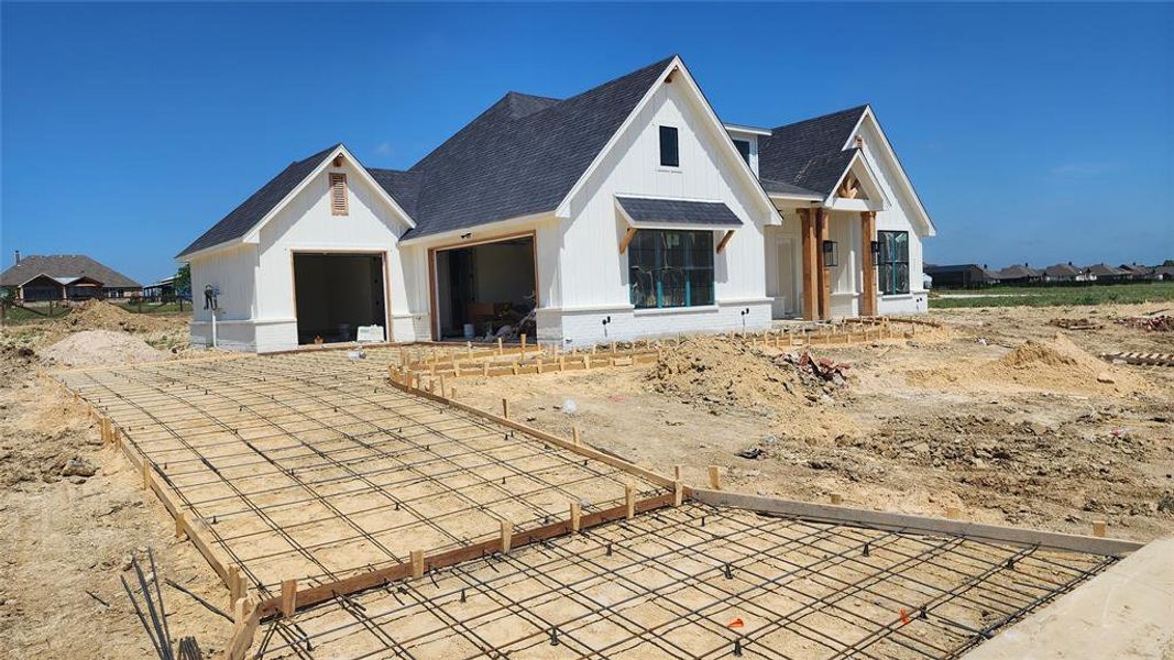 In-progress construction of a new home in Paloma Ranches, New Fairview, TX (Image 10).