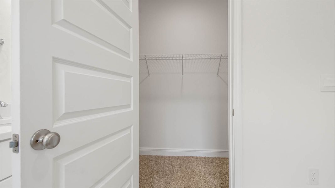 Representative unfurnished interior of a home built from the Kennedy by D.R. Horton in Bayside at Ward Creek, Panama City Beach (Image 27).