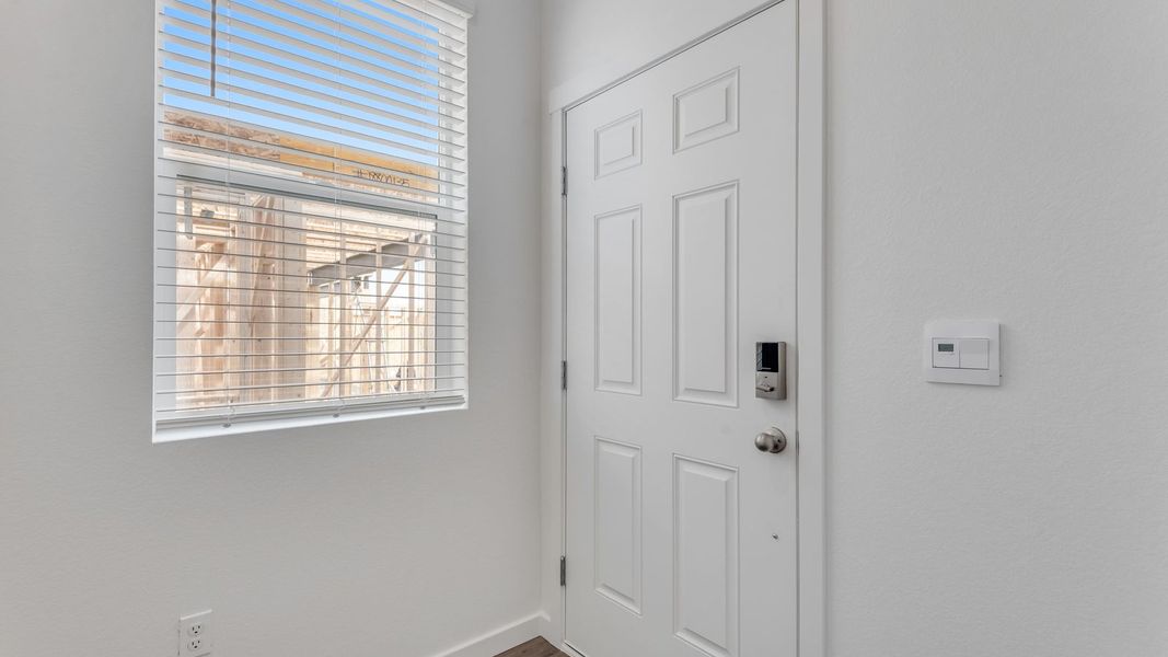 Representative unfurnished interior of a home built from the Juniper by D.R. Horton in Ellston Park, Colorado Springs (Image 15).