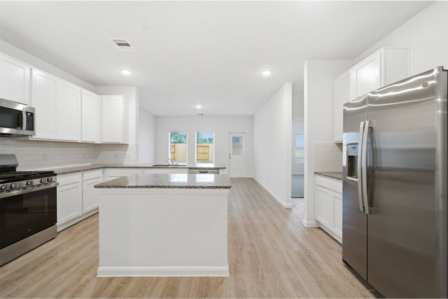 Furnished interior view inside a new home in The Canopies, Splendora (Image 5).
