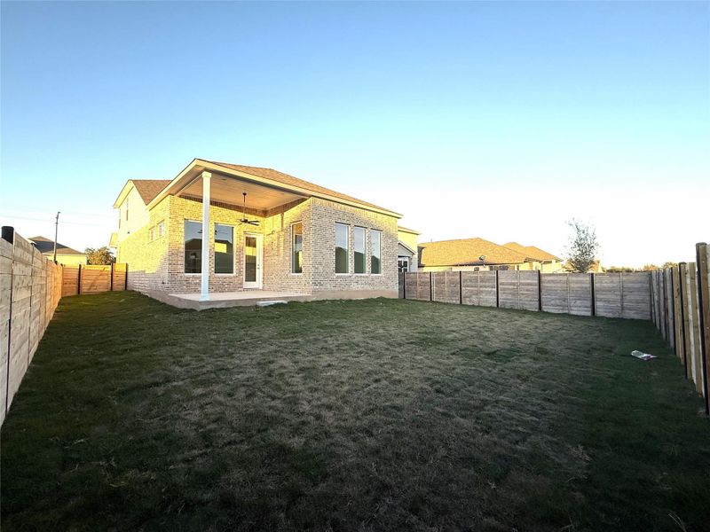 Exterior details and patio area of a home in Highland Village, Georgetown (Image 16).