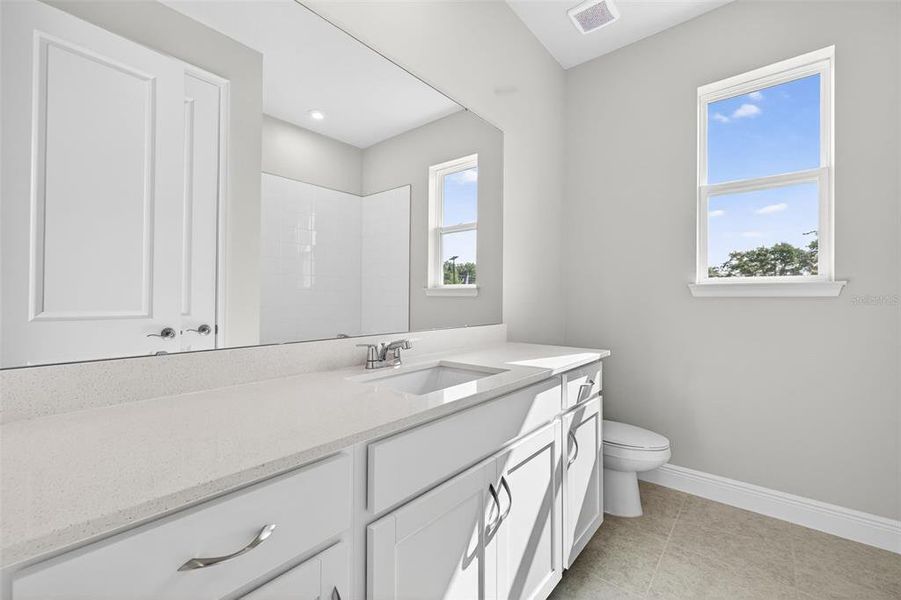 Furnished interior view inside a new home in Windwater, Parrish (Image 6).