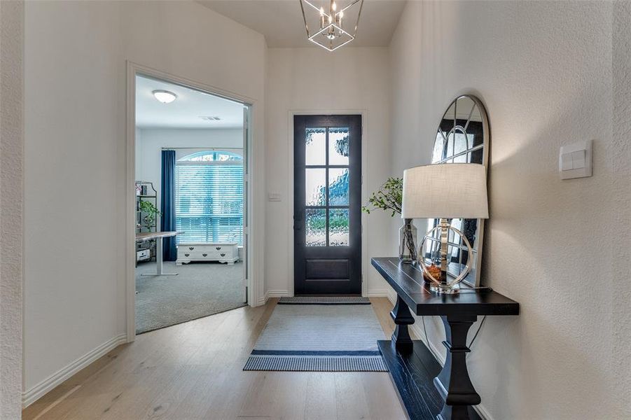 Furnished interior view inside a new home in Reunion 60s, Rhome (Image 26).