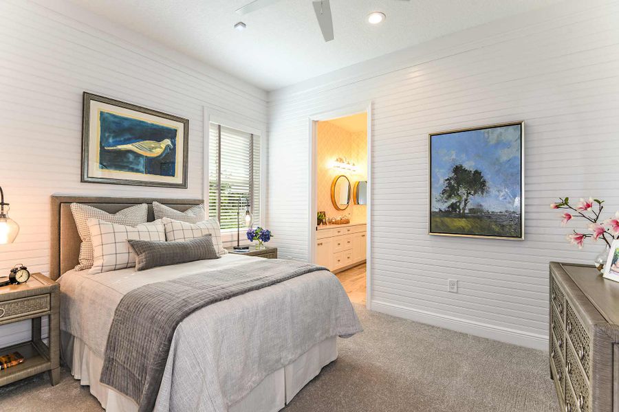 Representative furnished interior of a home built from the Kiawah 2 by Neal Communities in SkySail, Naples (Image 7).