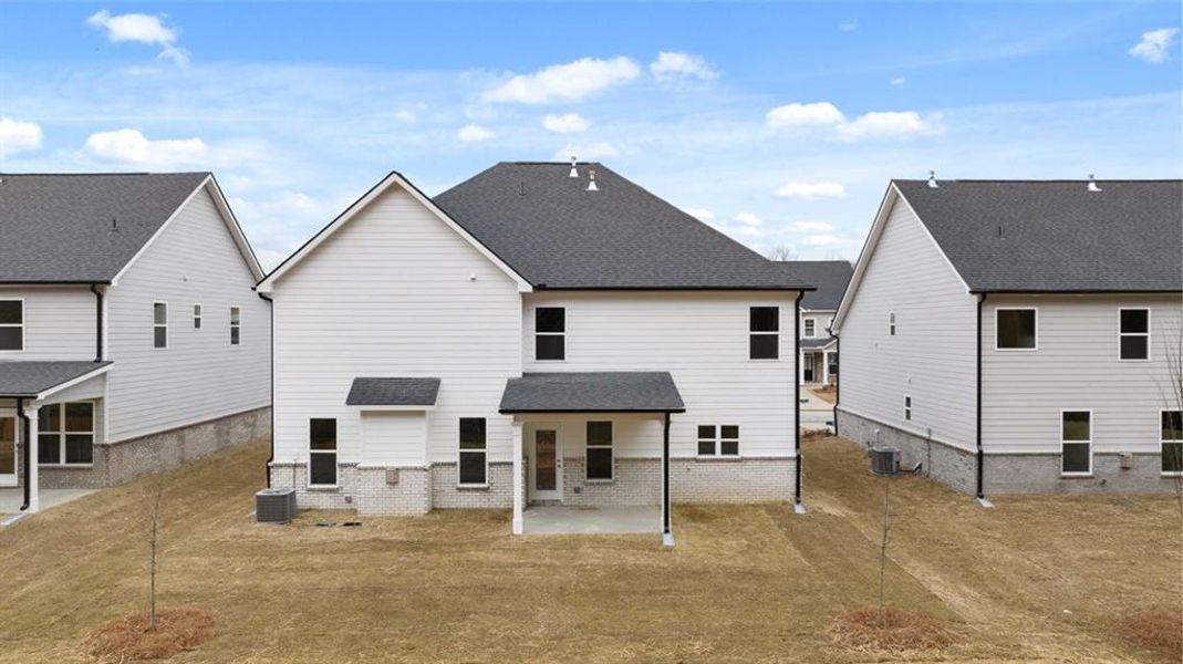 Exterior details and patio area of a home in Wildwood, Covington (Image 3). Exterior details and patio area of a home in Wildwood, Covington (Image 3).