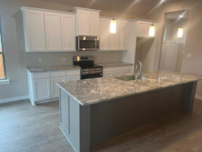 Furnished interior view inside a new home in , Van Alstyne (Image 5).