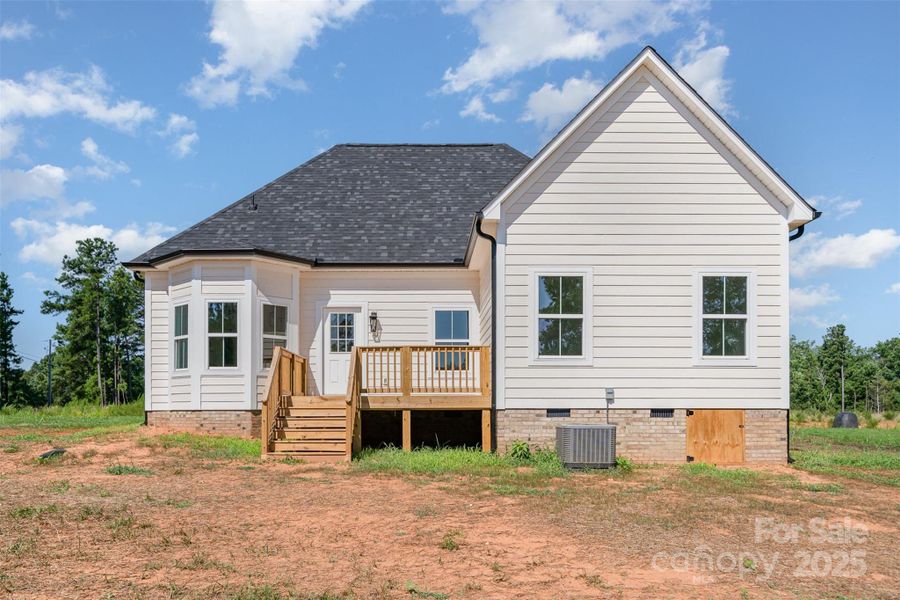 Front exterior of a new home in , China Grove, NC, highlighting curb appeal (Image 14).