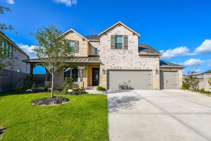 Three attached garages nicely blend into the front facade, atop a long, roomy driveway; with extended walkway to the covered front porch and main entrance. Inside this new 2-story home are 4/5 bedrooms and 3-1/2 baths, comprising a 13,019 square-foot-lot with 3,274 square-feet of lush interior living space. Three attached garages nicely blend into the front facade, atop a long, roomy driveway; with extended walkway to the covered front porch and main entrance. Inside this new 2-story home are 4/5 bedrooms and 3-1/2 baths, comprising a 13,019 square-foot-lot with 3,274 square-feet of lush interior living space.