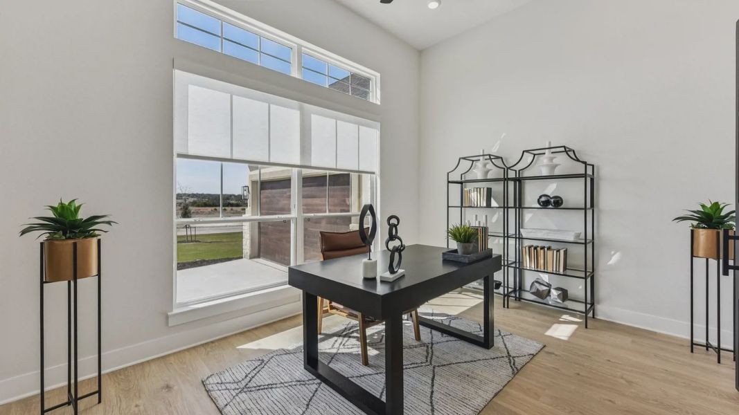 Representative furnished interior of a home built from the Garet by Chesmar Homes in Feathergrass, Florence (Image 12).