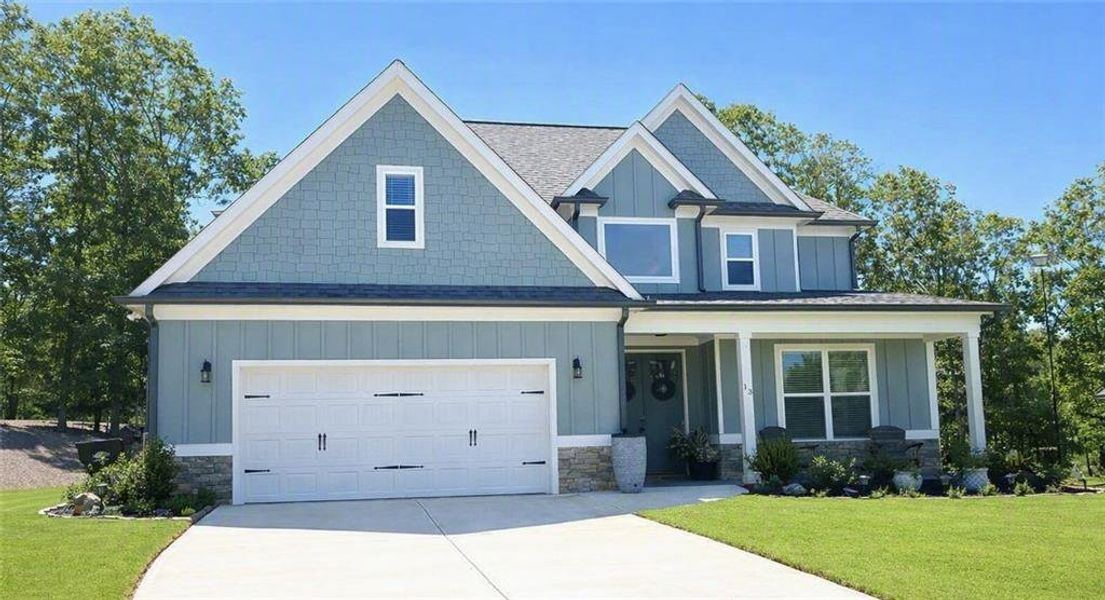Front exterior of a new home in Griffin Manor, Cartersville, GA, highlighting curb appeal (Image 1). Front exterior of a new home in Griffin Manor, Cartersville, GA, highlighting curb appeal (Image 1).