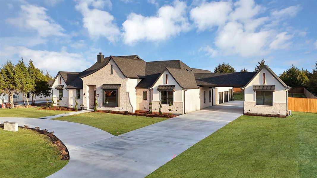 Front exterior of a new home in , Waxahachie, TX, highlighting curb appeal (Image 2). Front exterior of a new home in , Waxahachie, TX, highlighting curb appeal (Image 2).