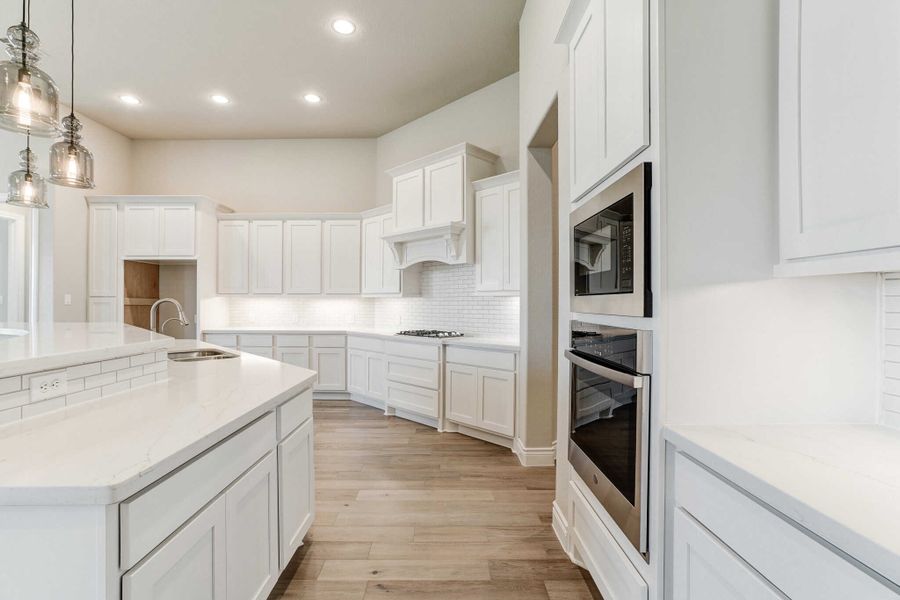Representative furnished interior of a home built from the 2688 by Ravenna Homes in The Woodlands Hills 65′, Willis (Image 8).