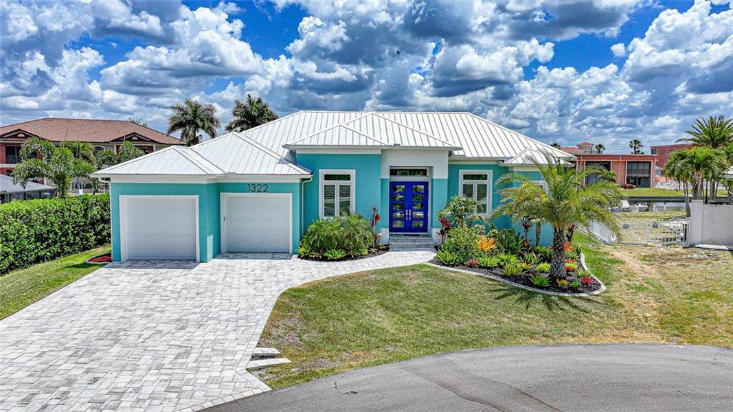 Front exterior of a new home in , Punta Gorda, FL, highlighting curb appeal (Image 23).
