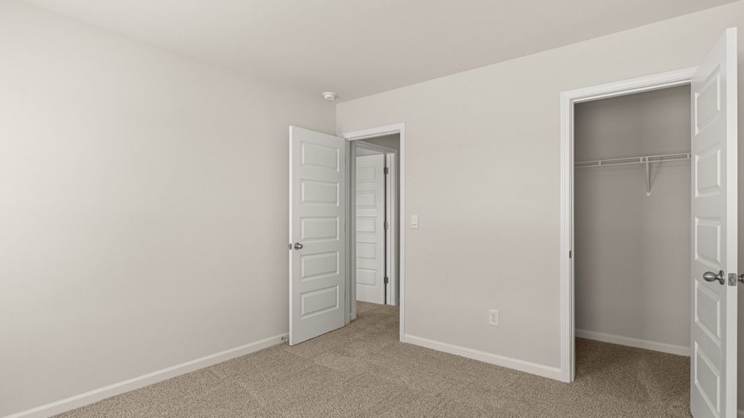 Spacious, unfurnished interior of a new home in Brookland Commons, Monroe (Image 27).