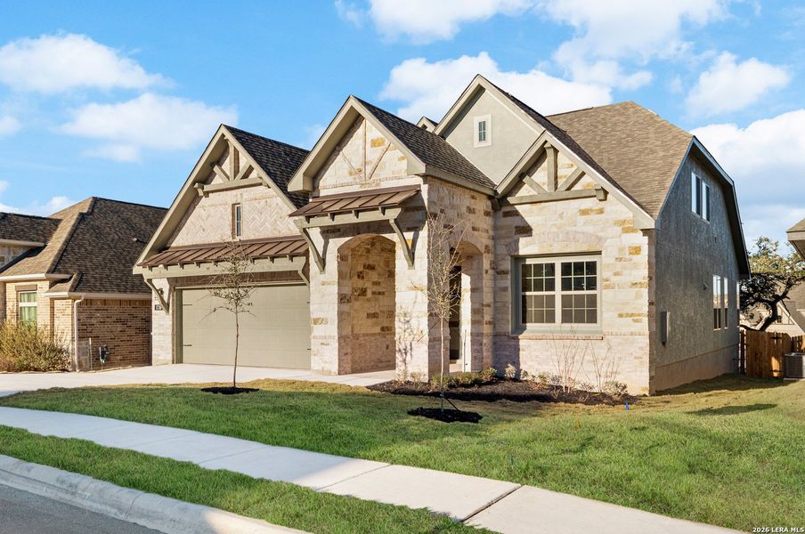 Front exterior of a new home in Ventana, Bulverde, TX, highlighting curb appeal (Image 20).