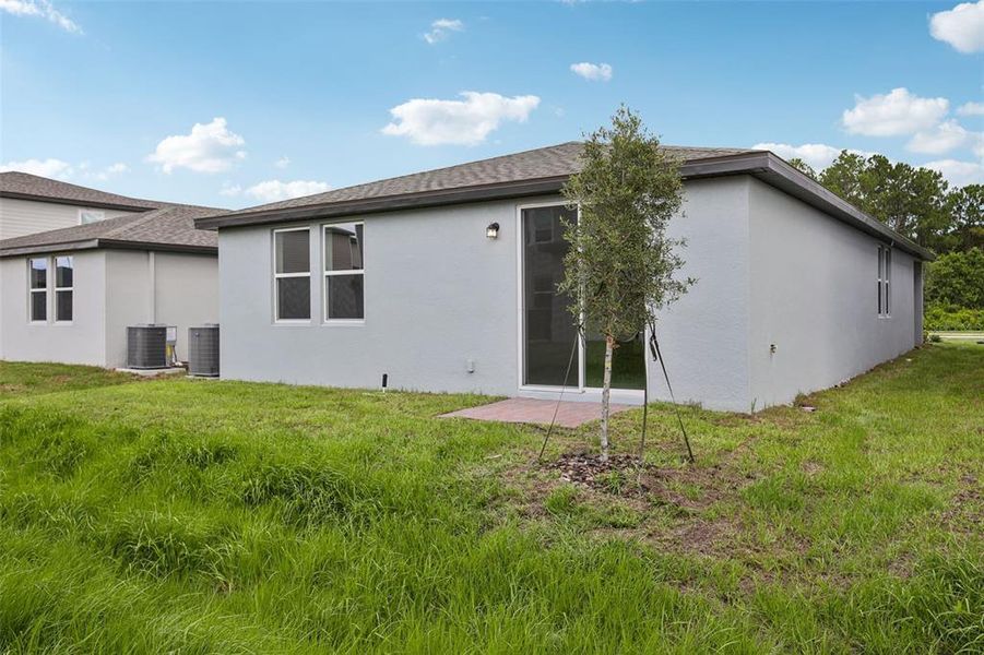 Exterior details and patio area of a home in Villamar - Classic Series, Winter Haven (Image 17).