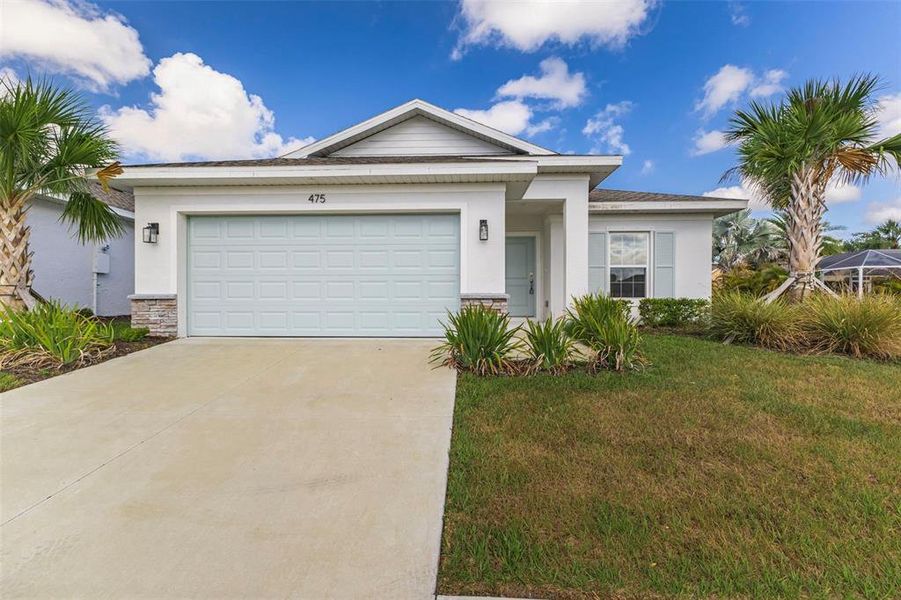 Front exterior of a new home in , Port Charlotte, FL, highlighting curb appeal (Image 24). Front exterior of a new home in , Port Charlotte, FL, highlighting curb appeal (Image 24).