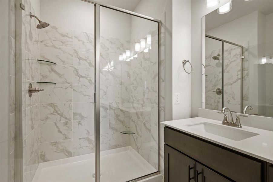 You'll never want to leave this spacious walk in owner's shower!