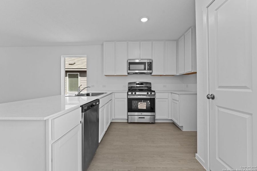 Furnished interior view inside a new home in Torian Village: Watermill Collection, San Antonio (Image 4).