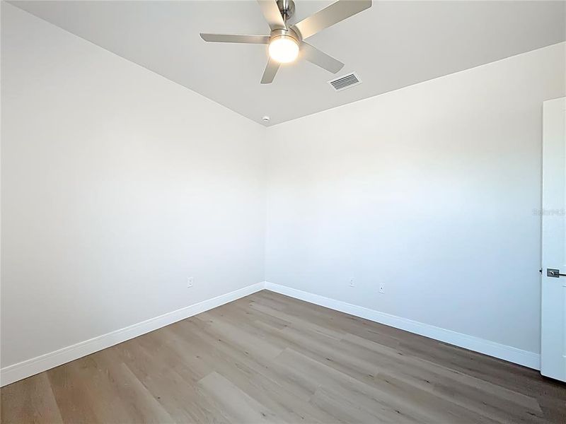 Spacious, unfurnished interior of a new home in , Port Charlotte (Image 41).