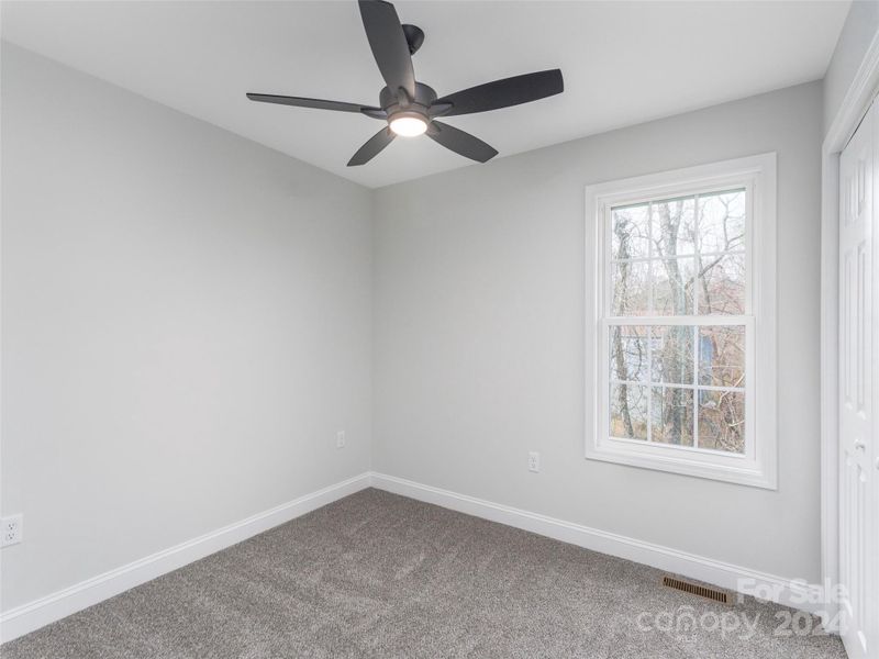 Spacious, unfurnished interior of a new home in , Asheville (Image 19).