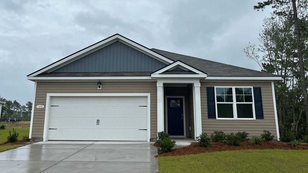 Front exterior of a new home in Preserve at Cypress Commons, Conway, SC, highlighting curb appeal (Image 1).