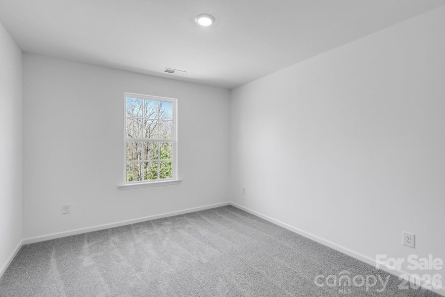 Spacious, unfurnished interior of a new home in Cannon Village, York (Image 11).