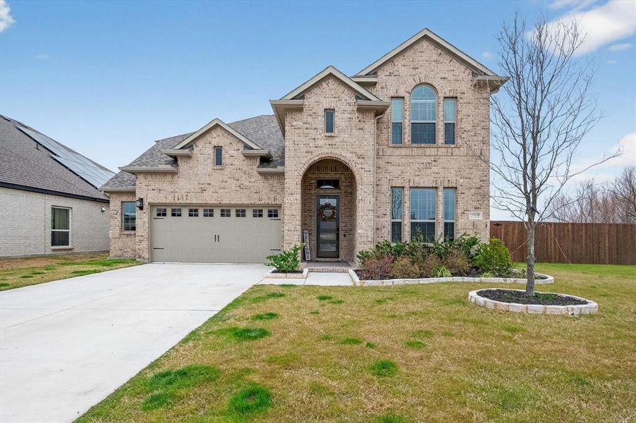 Front exterior of a new home in Oaks of North Grove, Waxahachie, TX, highlighting curb appeal (Image 22).