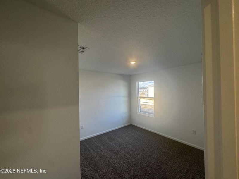 Spacious, unfurnished interior of a new home in The Arbors, Jacksonville (Image 33).