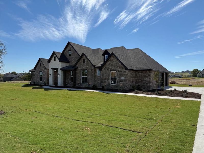 Front exterior of a new home in Aledo Heights - Aledo ISD, Aledo, TX, highlighting curb appeal (Image 1).