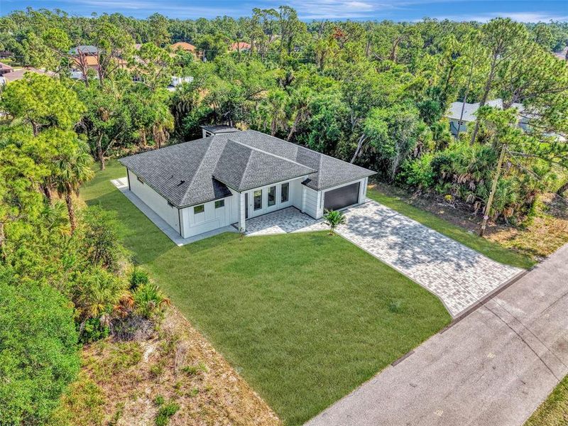 Front exterior of a new home in , North Port, FL, highlighting curb appeal (Image 28).