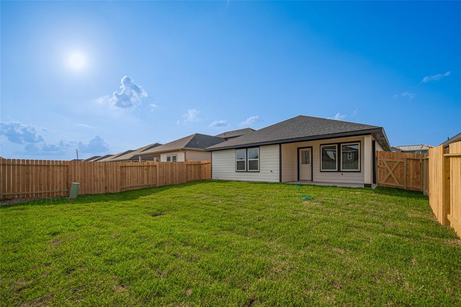 Exterior details and patio area of a home in Tamarron, Fulshear (Image 3). Exterior details and patio area of a home in Tamarron, Fulshear (Image 3).