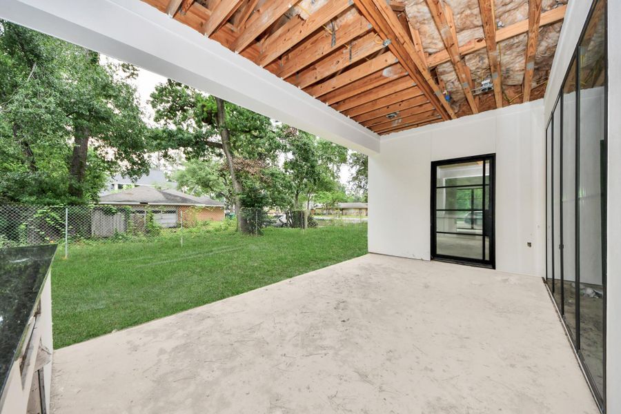 Exterior details and patio area of a home in , Houston (Image 13). Exterior details and patio area of a home in , Houston (Image 13).