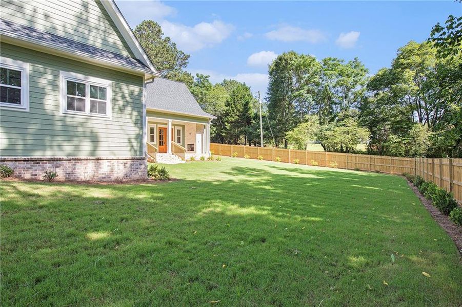 Front exterior of a new home in , Canton, GA, highlighting curb appeal (Image 26). Front exterior of a new home in , Canton, GA, highlighting curb appeal (Image 26).