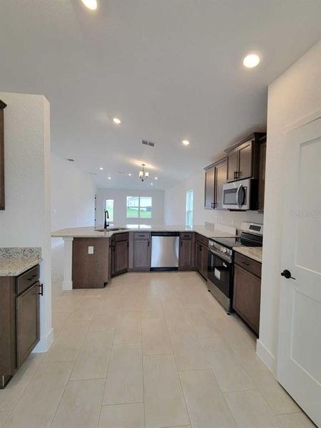 Furnished interior view inside a new home in Ocala Crossings South, Ocala (Image 7).