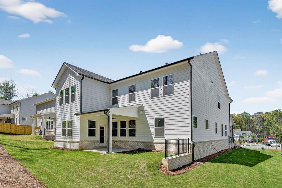 Exterior details and patio area of a home in Bailey Fence, Dacula (Image 22).
