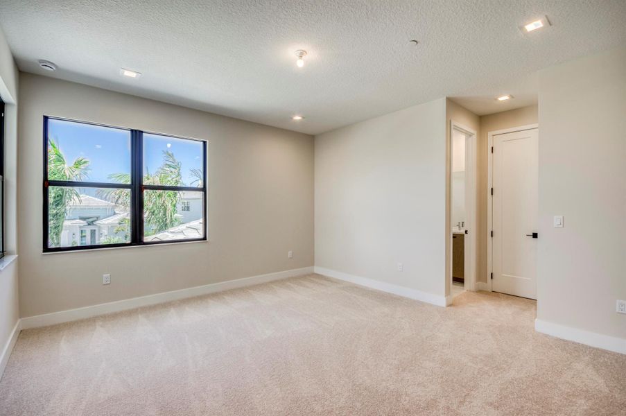 Furnished interior view inside a new home in Apex at Avenir, Palm Beach Gardens (Image 26).