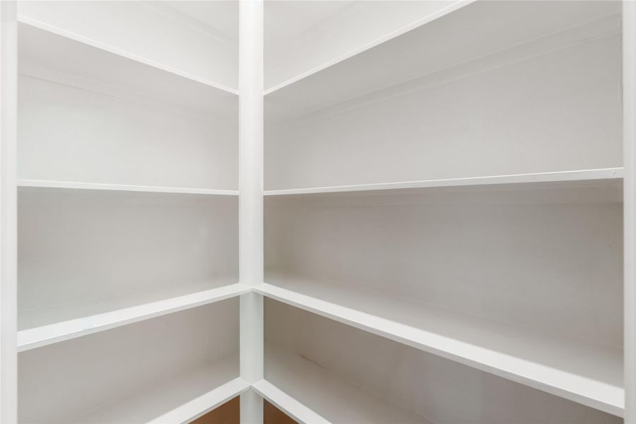 Your walk-in pantry is equipped with built-in shelving, for all of your kitchen appliances and groceries that you want tucked away. Your walk-in pantry is equipped with built-in shelving, for all of your kitchen appliances and groceries that you want tucked away.