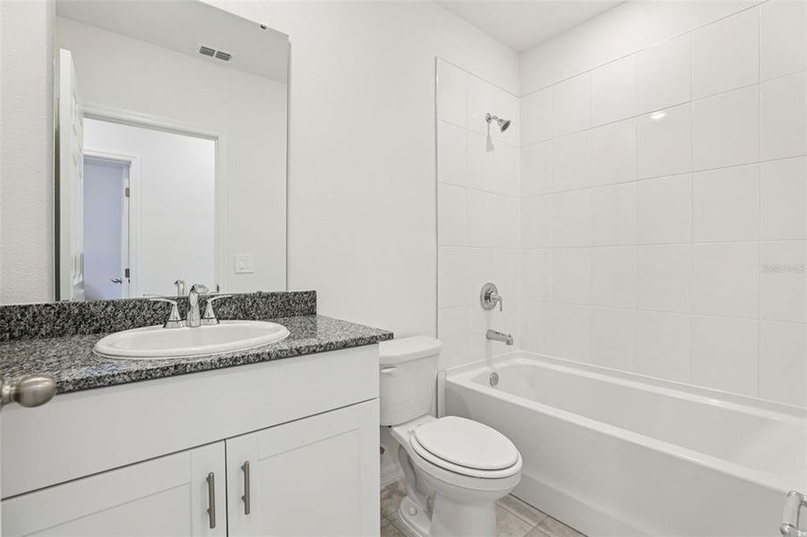 Furnished interior view inside a new home in Lawson Dunes - Signature Series, Haines City (Image 11).