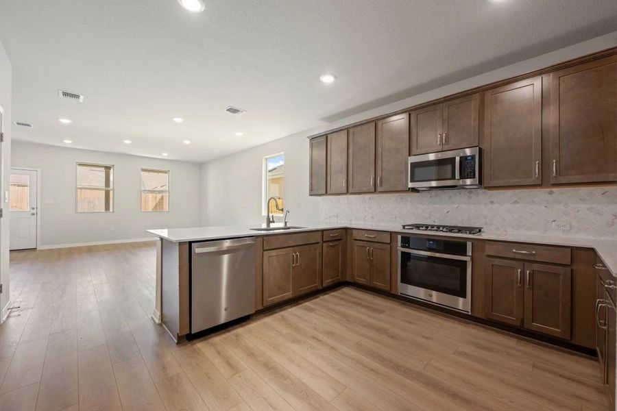 Furnished interior view inside a new home in Rolling Glen, Hutto (Image 5).