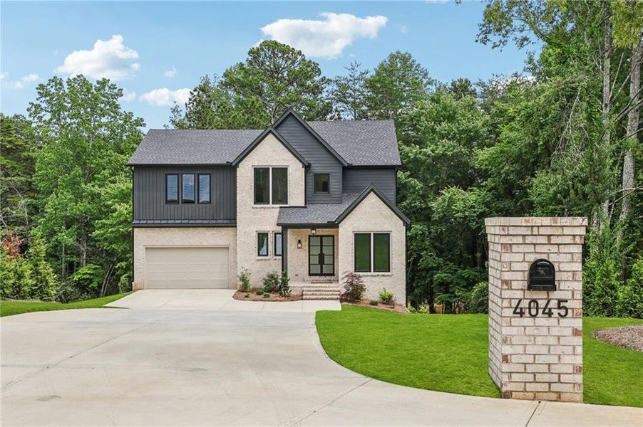 Front exterior of a new home in , Cumming, GA, highlighting curb appeal (Image 30).