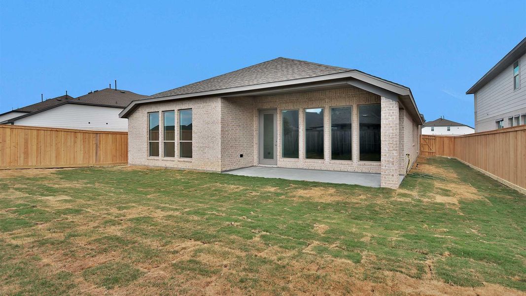 Exterior details and patio area of a home in Bridgeland, Cypress (Image 4).