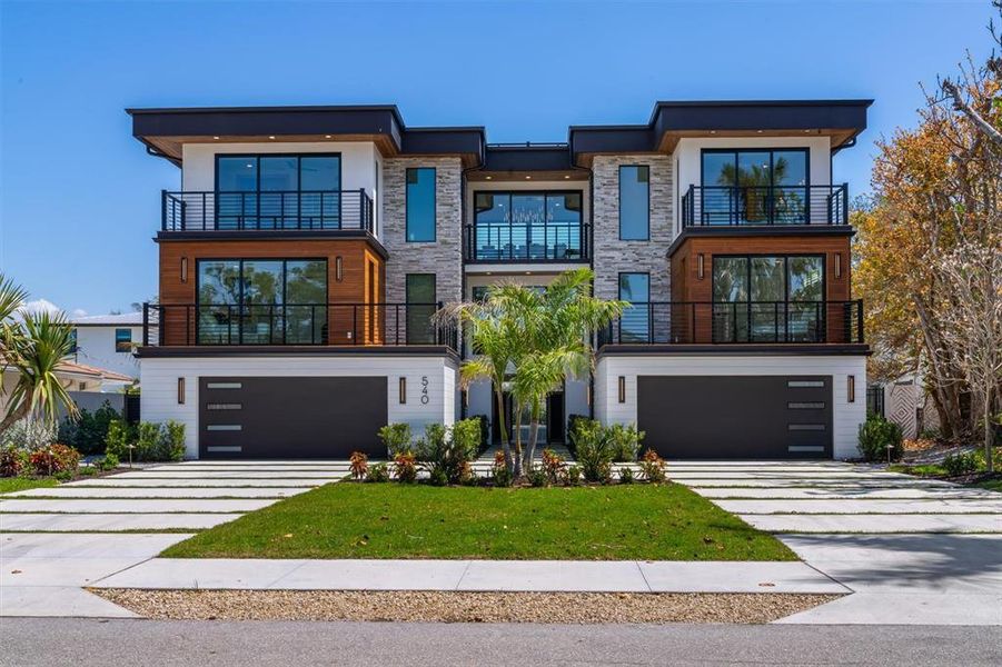 Front exterior of a new home in , Sarasota, FL, highlighting curb appeal (Image 23).