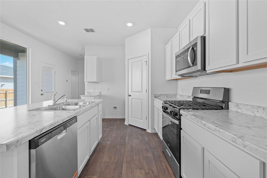 Furnished interior view inside a new home in Valverde, Bastrop (Image 12).