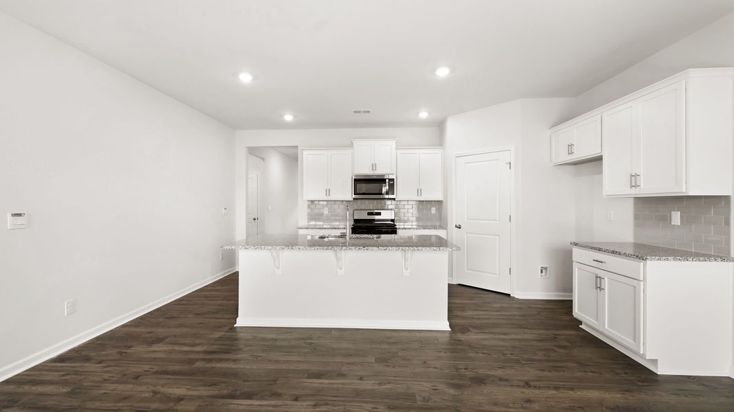 Furnished interior view inside a new home in Tap Root Farms, Fletcher (Image 10).