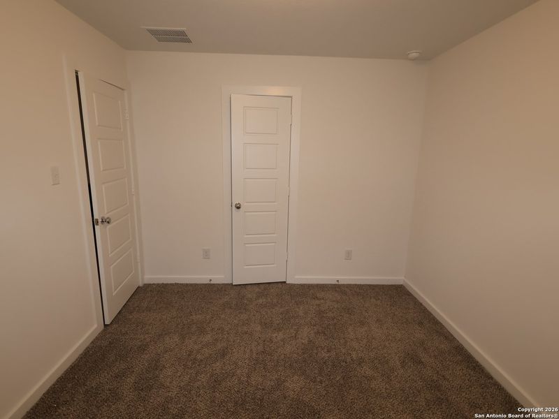 Spacious, unfurnished interior of a new home in Winding Brook, San Antonio (Image 15).
