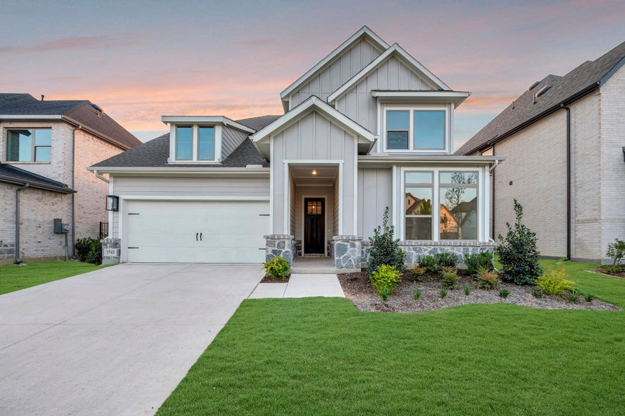 Front exterior of a new home in Goodland – Classic Series, Grand Prairie, TX, highlighting curb appeal (Image 1). Front exterior of a new home in Goodland – Classic Series, Grand Prairie, TX, highlighting curb appeal (Image 1).
